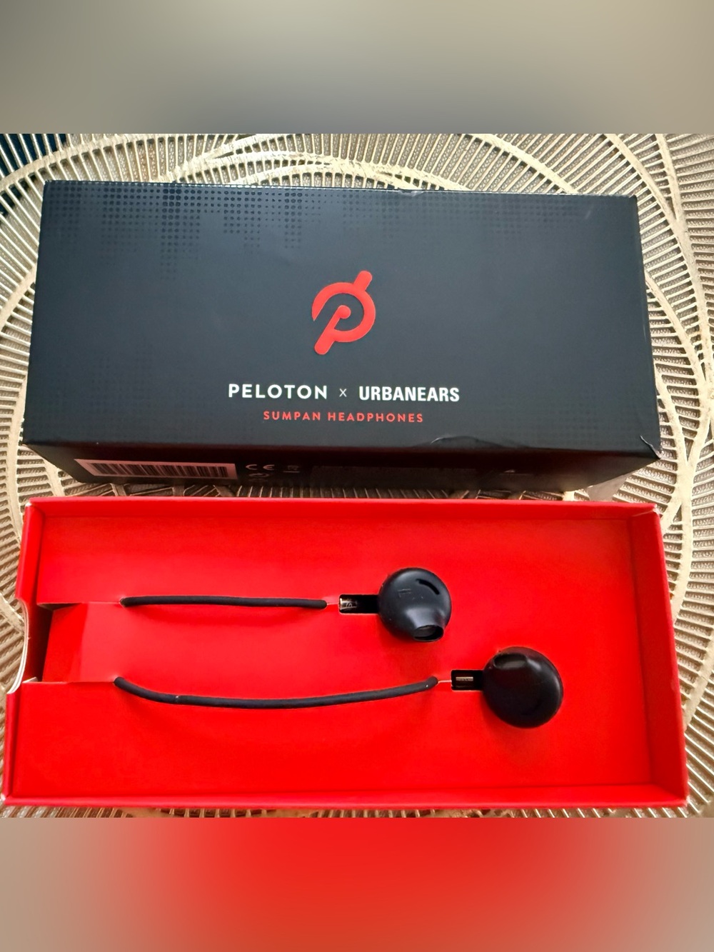 Peloton x Urbanears Sumpan Headphones in Black and Red